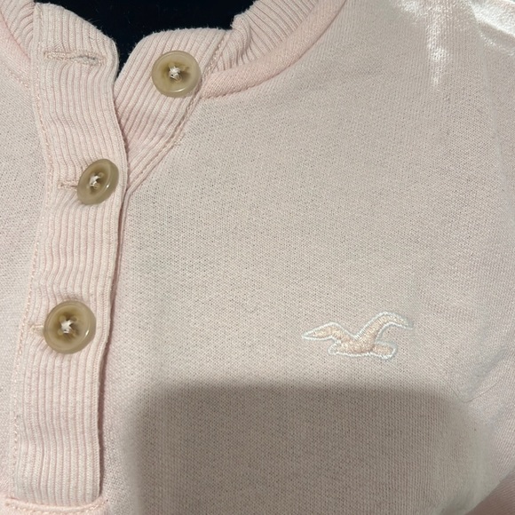 Hollister light pink sweatshirt with buttons halfway down the front. Size XS. - Picture 2 of 2